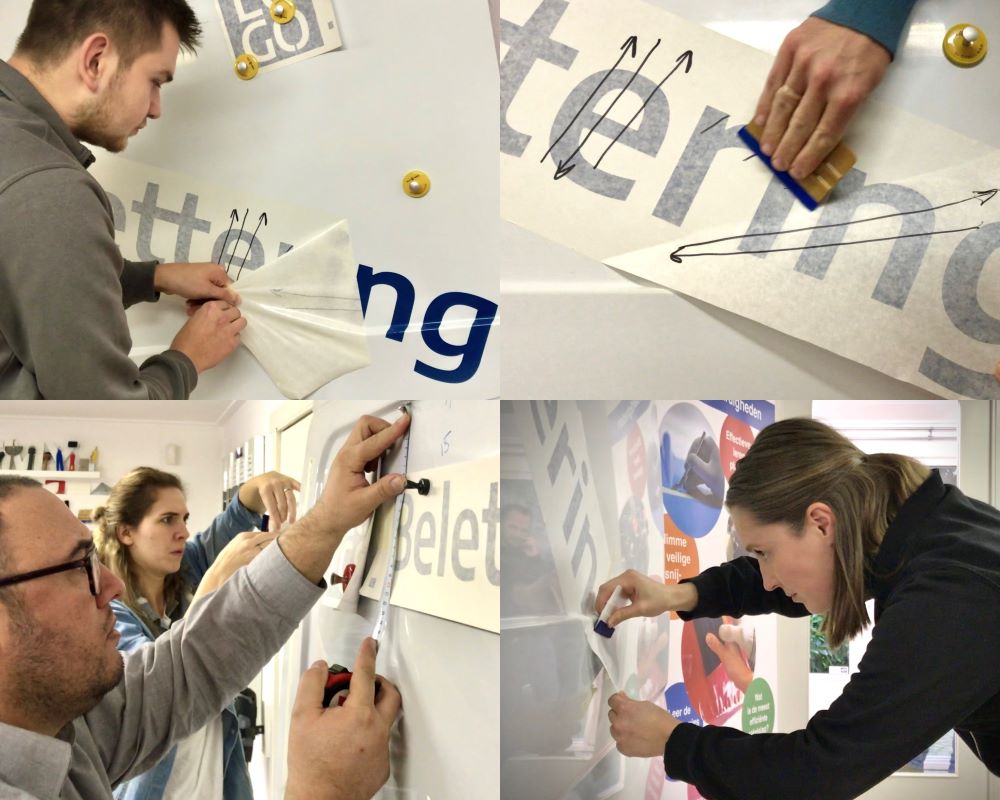 Cursisten leren zelfklevende logo`s en teksten uit te meten en te plakken tijdens de Appcademy signmaker opleiding