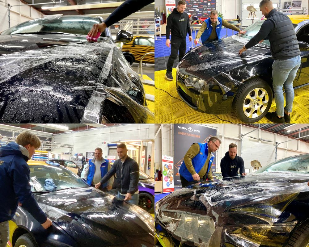 Trainer en cursisten plakken PPF op motorkap tijdens Appcademy Paint Protection Film training