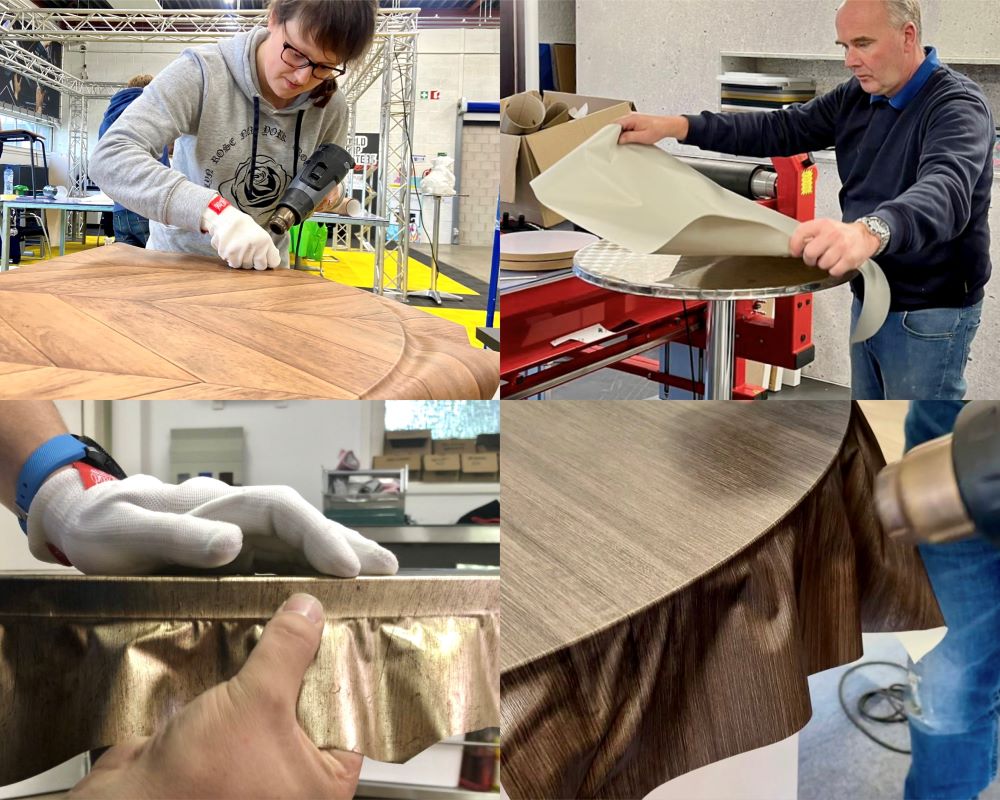 Cursisten wrappen de bovenkant en zijkant van een bistro tafel als praktijkoefening tijdens de Appcademy training interieurfolie plakken en keukens wrappen