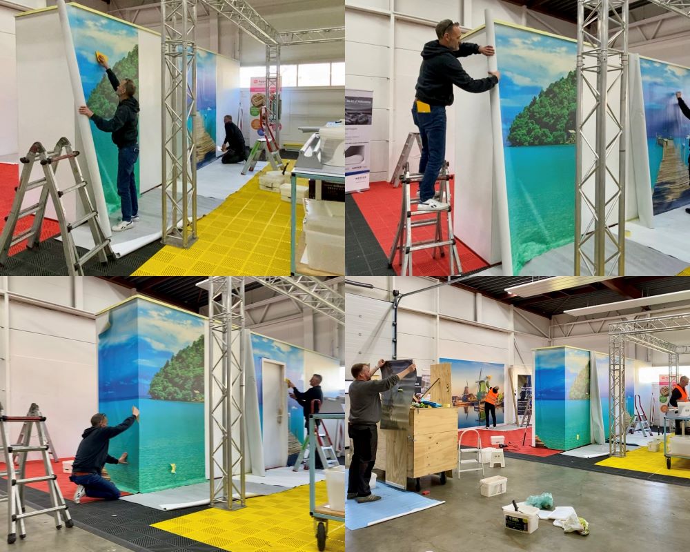 Cursisten plakken naadloos fotobehang om meerdere wanden tijdens Appcademy Naadloos fotobehang opleiding en training