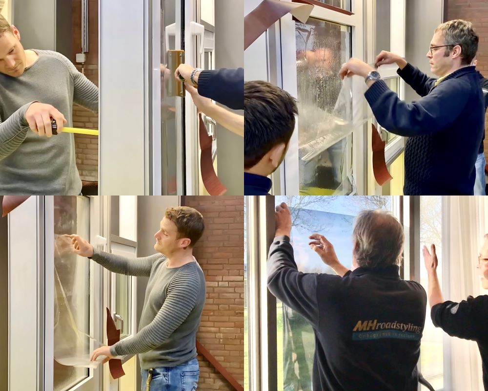 Trainer en cursist brengen raamfolie aan op glaswerk als demo en oefeningen tijdens Appcademy Architectural Windowfilm cursus